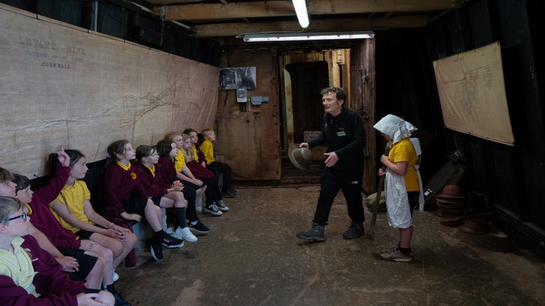 School group at Levant Mine, in the skip shaft
